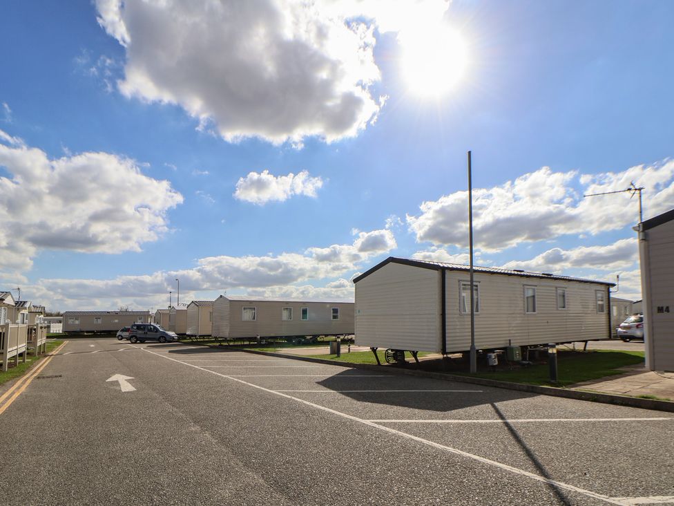 An outdoor view of caravans on a road at K2 Static Caravan