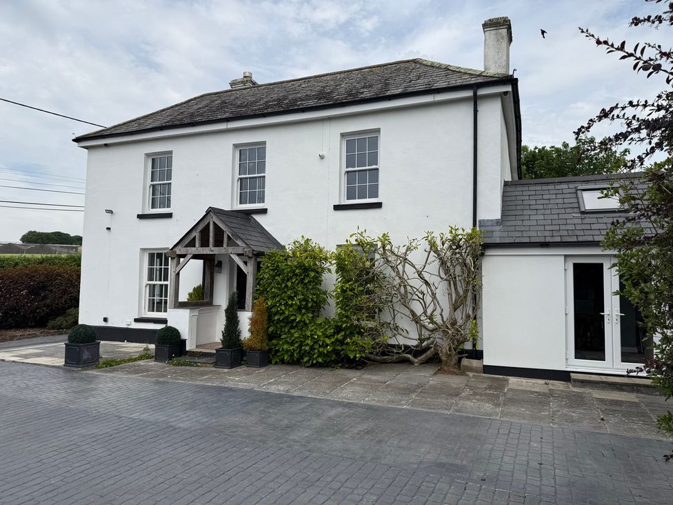 A house with a pathway and plants at Penlaurel in Launceston