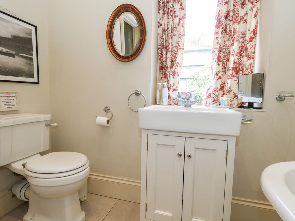 A bathroom with a sink and toilet at Maple Cottage Buckland Newton near Dorchester