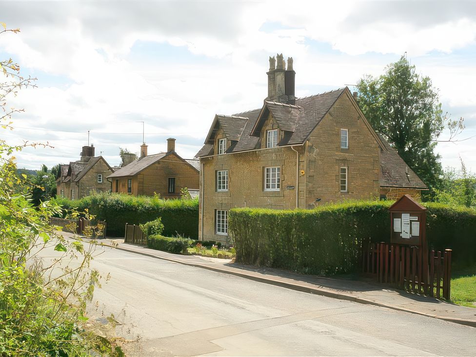 Exterior view of multiple houses along a street at Elm View in Chipping Campden