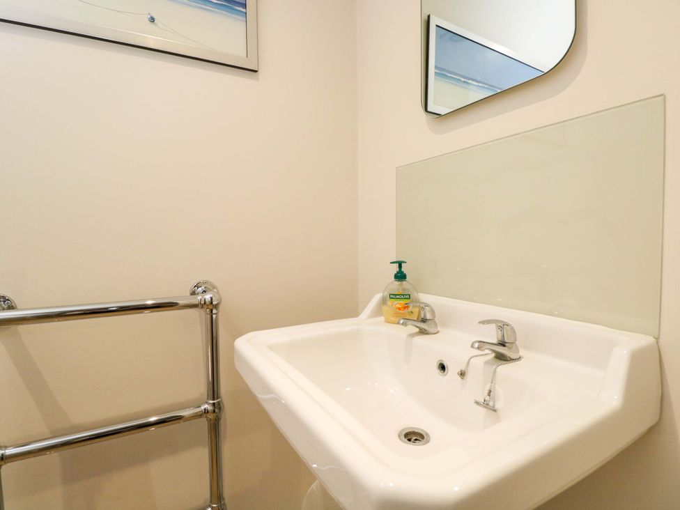 A bathroom with a hand basin and soap dispenser at Church View in Bourton-On-The-Water