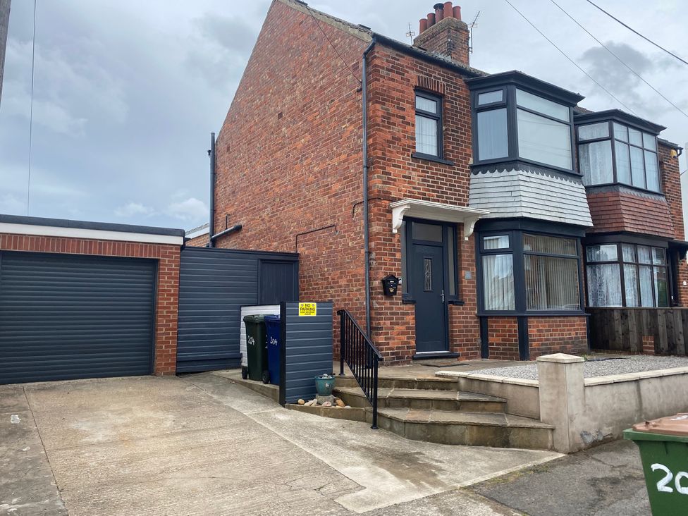 A house with a garage and driveway at 204 Sea View House Marske-by-the-Sea