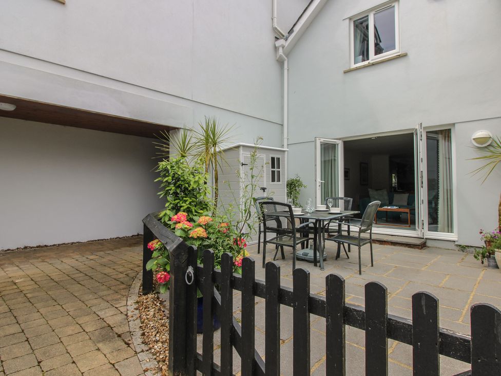 An outdoor patio area with table and chairs at 16 Bolt Head Salcombe