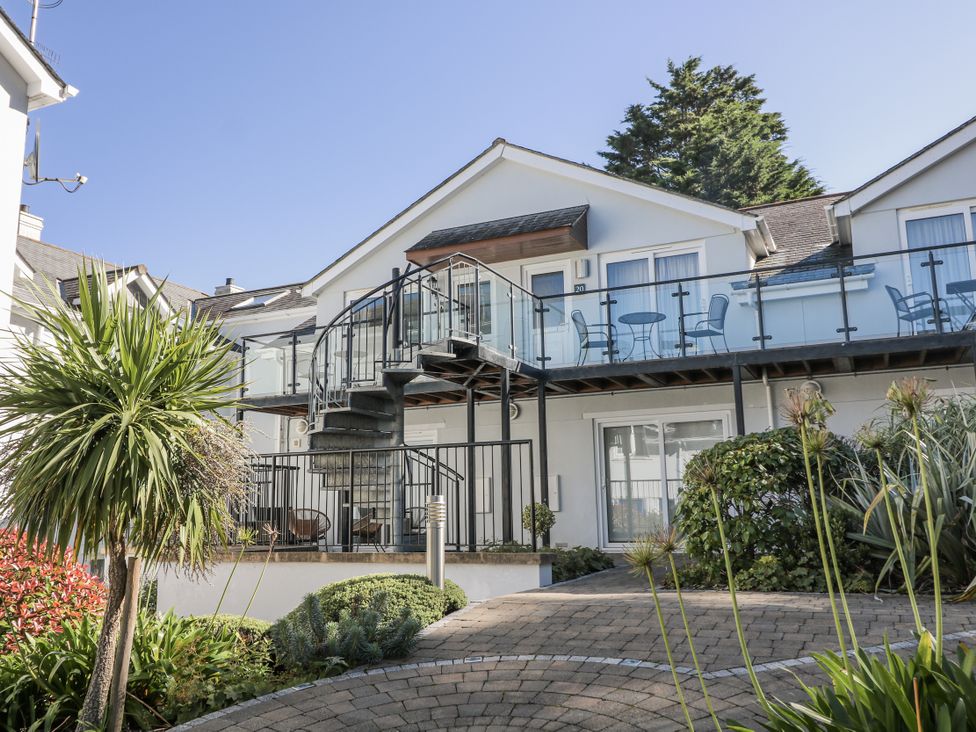 An outdoor view of a building with a staircase and balcony at 19 Bolt Head, Salcombe