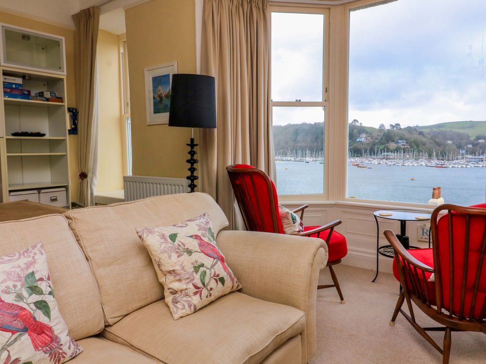 A living room with a view of the marina at 3 Dartview, Dartmouth