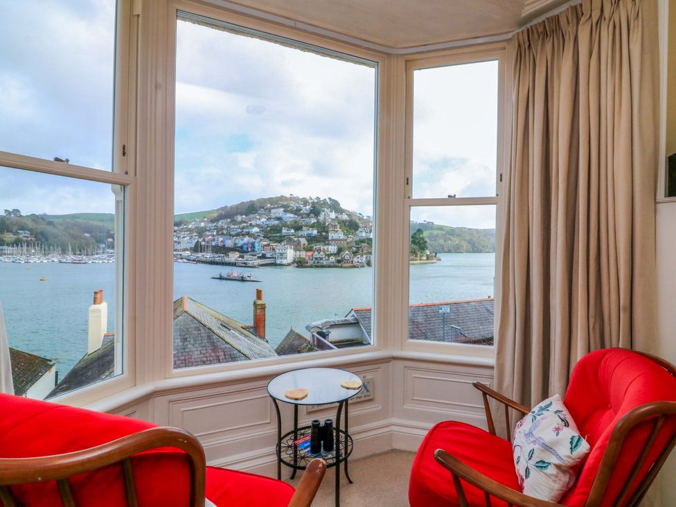 A living room with a view of the water at 3 Dartview in Dartmouth