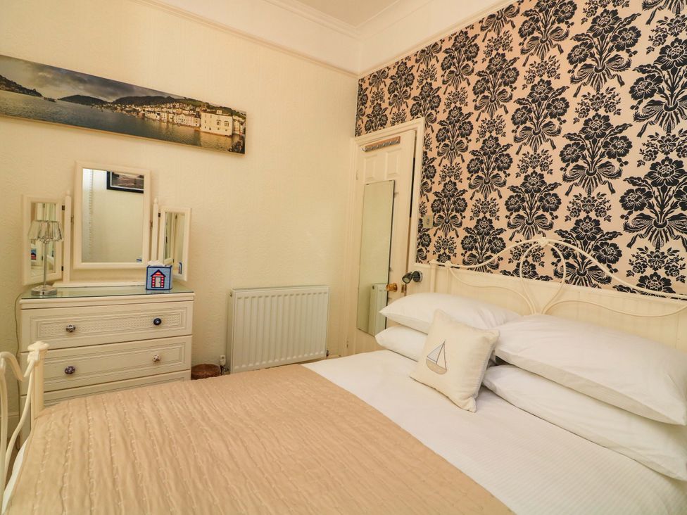 A bedroom with a bed and dresser at 3 Dartview in Dartmouth