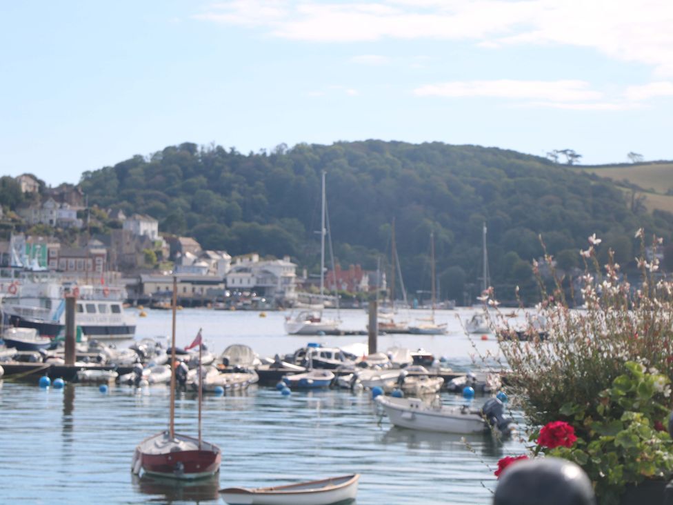 A view of boats in water with buildings and hills in the background at 3 Dartview Dartmouth