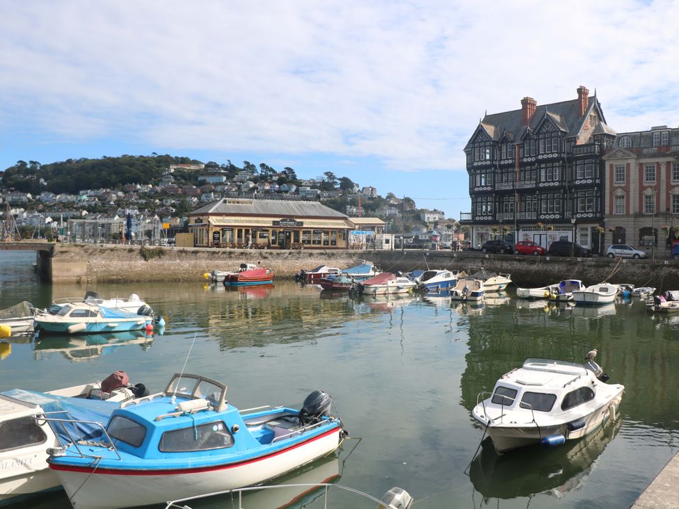 A harbor with boats and buildings near the water at 3 Dartview, Dartmouth