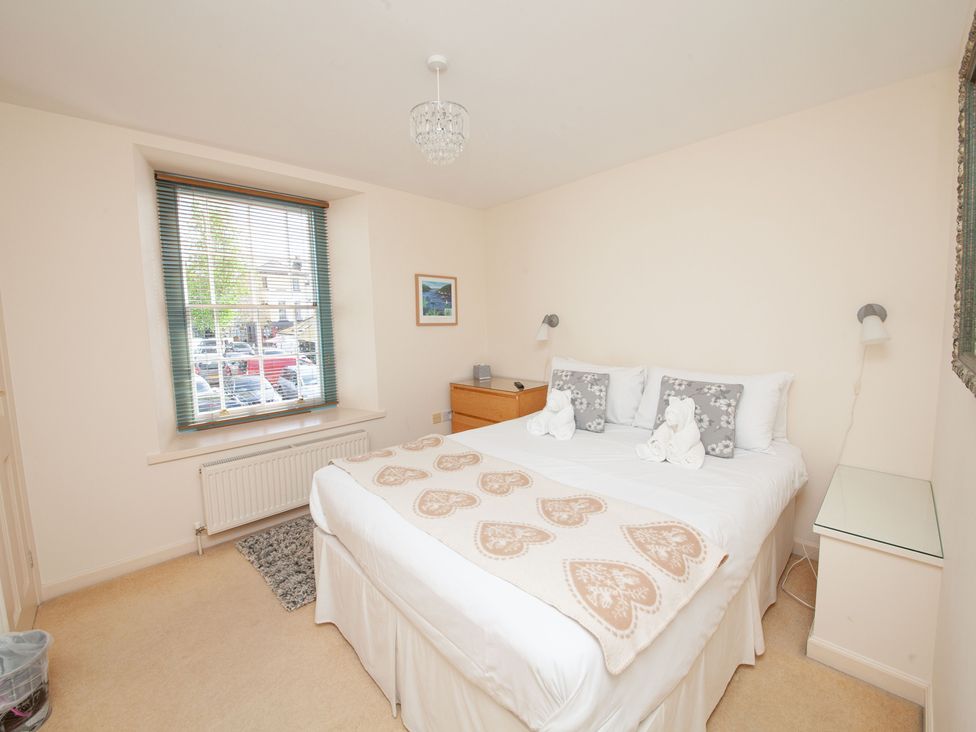 A bedroom with a bed and window at 7 Charles Street Dartmouth