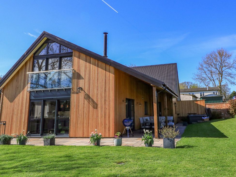 A house with a garden and balcony at The Old Dairy in Cotleigh near Honiton