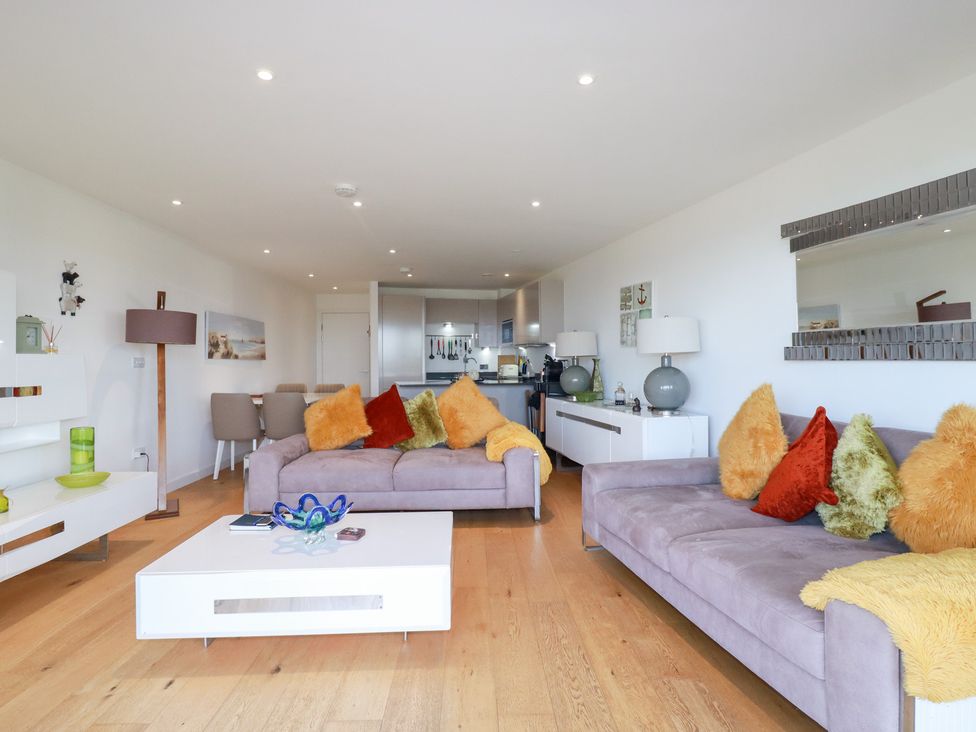 A living room with sofas and a coffee table at Apartment no.21 in Newquay