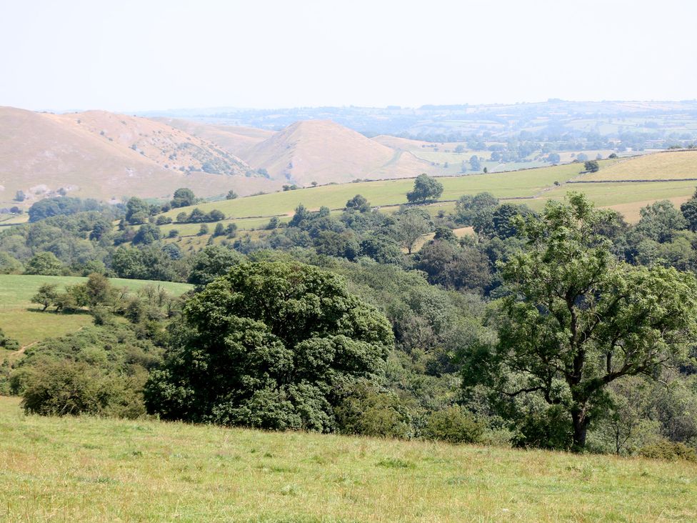 A landscape view with hills and trees at Slade House in Ilam, Staffordshire