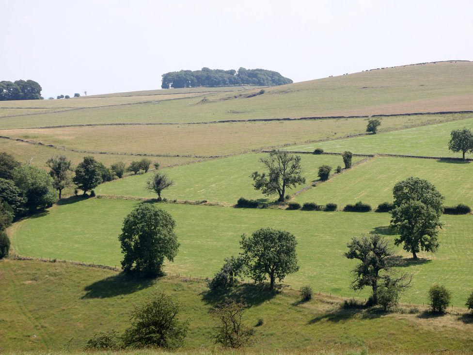 Landscape with fields and trees at Slade House in Ilam, Staffordshire