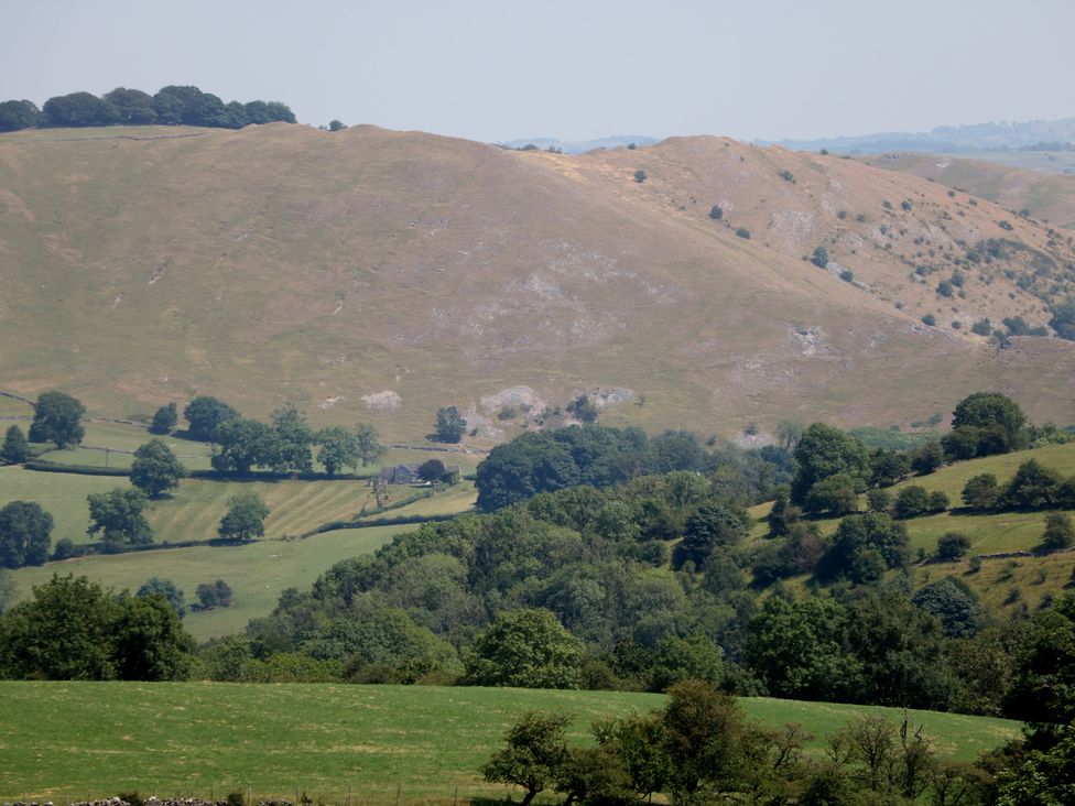 A landscape with hills and trees at Slade House, Ilam, Staffordshire