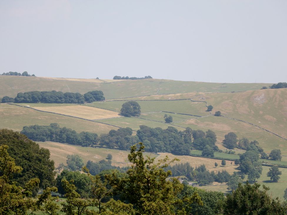 A landscape with hills and trees at Slade House in Ilam Staffordshire