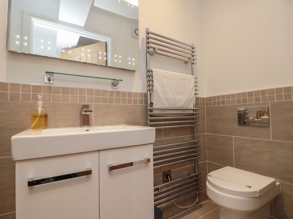A bathroom with a sink and toilet at Sir Nigel Gresley @ Engine Shed, Whitby