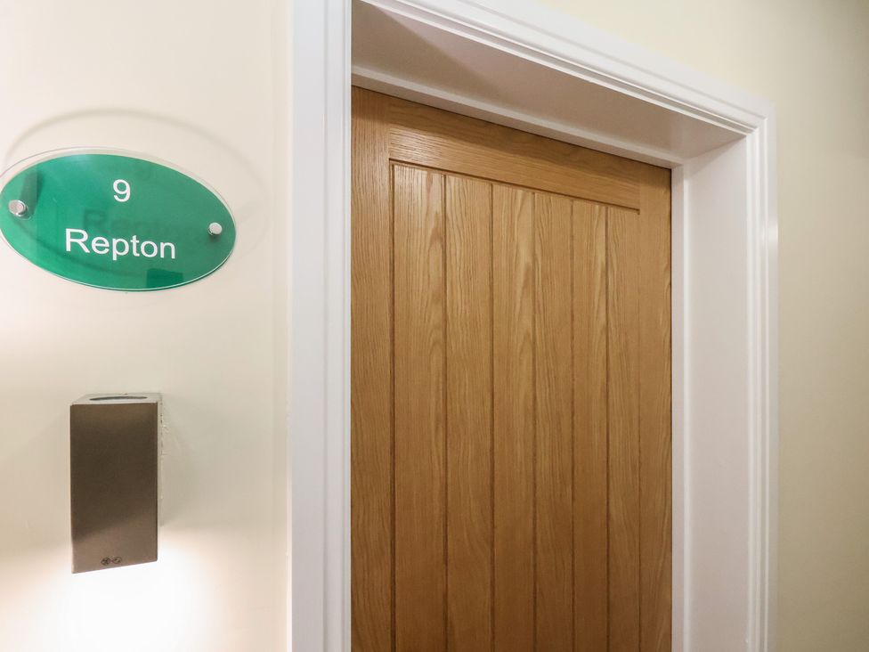 A door with a nameplate and mailbox at Repton @ Engine Shed in Whitby